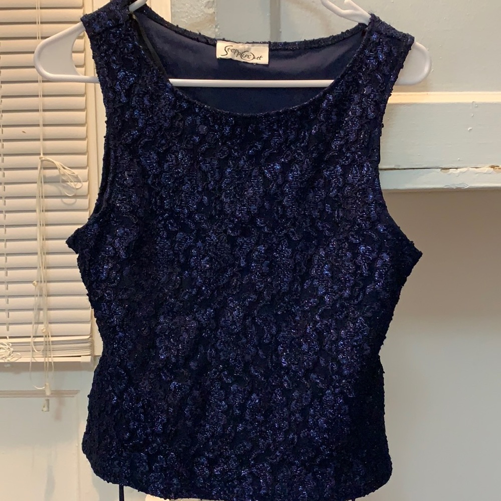 Sparkling blue top with sexy back exposed